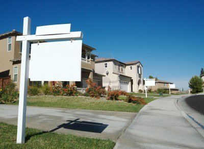 1935848-blank-real-estate-signs-in-a-row--ready-for-your-own-message
